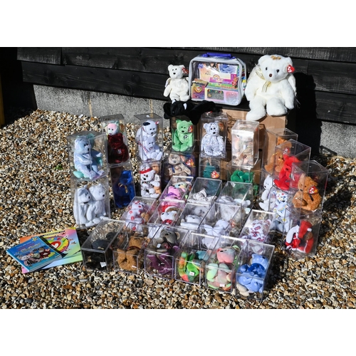 91 - A collection of over fifty Beanie Baby teddy bears - some boxed, to/w other related merchanise etc (... 