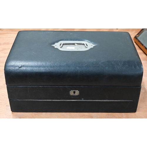 97 - A Victorian black morocco-bound travelling writing-box with fitted interior, 36 cm wide