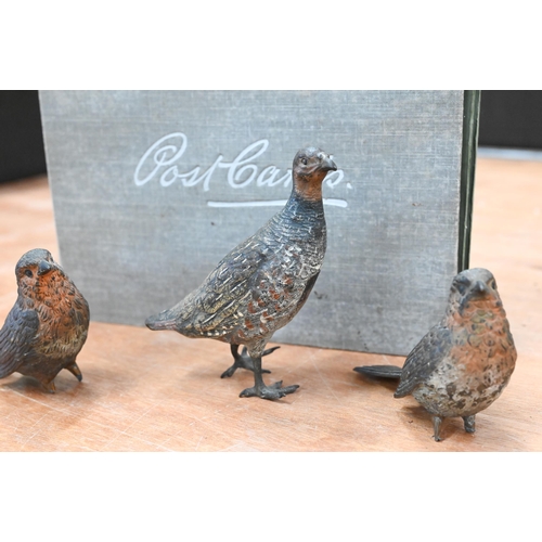 98 - A Bergmann-style cold-painted bronze partridge (indistinctly stamped), 11 cm high to/w two robins (b... 