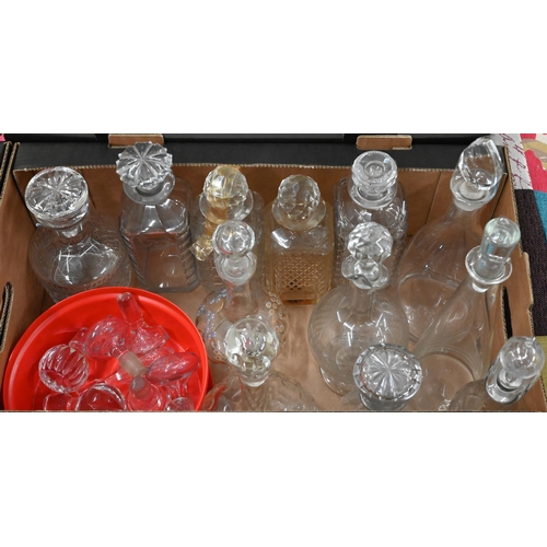 25 - Various Georgian and later cut and moulded glass decanters with stoppers and spare stoppers (box)
