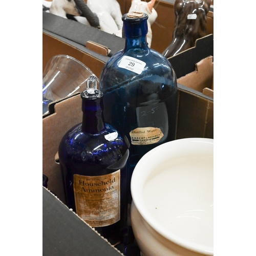 29 - Four vintage blue glass chemists bottles to/w a Poole Volcano charger (repaired), Victorian blue and... 