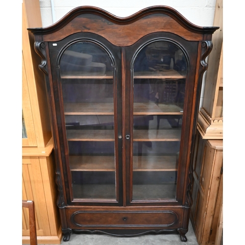 459 - A mahogany display cabinet, the pair of glazed doors enclosing adjustable shelving over single drawe... 