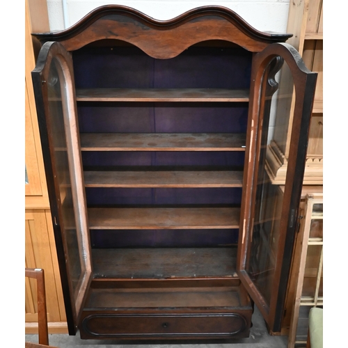 459 - A mahogany display cabinet, the pair of glazed doors enclosing adjustable shelving over single drawe... 