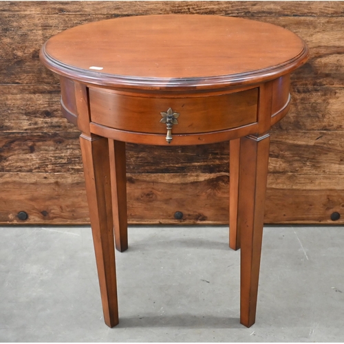 461 - A circular cherrywood Barker & Stonehouse 'flagstone' lamp table with single drawer and tapering... 