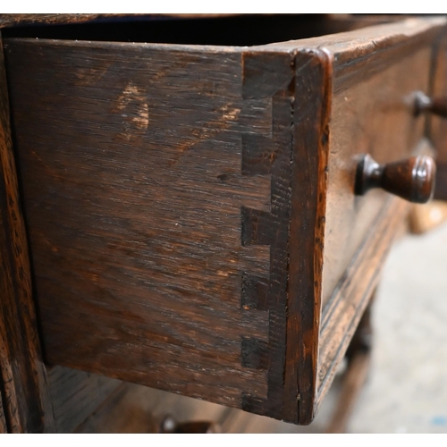 481 - An Ipswich quality carved oak sideboard in the 17th century style with two central drawers flanked b... 