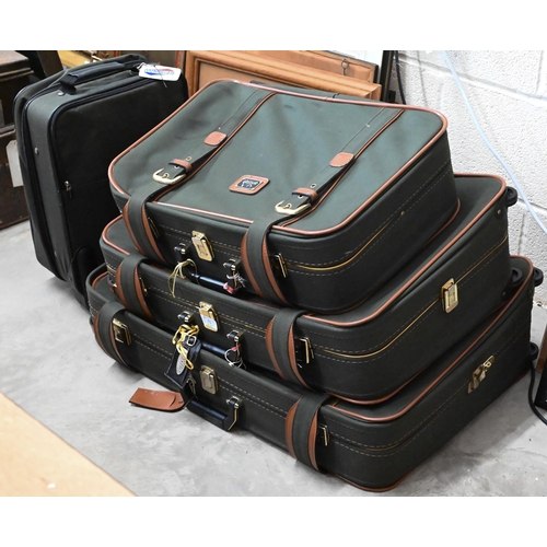 75 - A graduated set of three Antler suitcases, to/w a similar carry-on case (4)