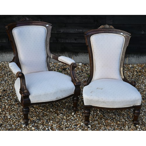 472 - An Edwardian walnut parlour chair with cream geometric upholstery to/w matching nursing chair (2)