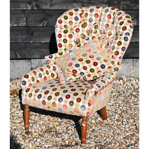 471 - A modern spoonback nursing/bedroom chair with button back multi-coloured circle patterned fabric