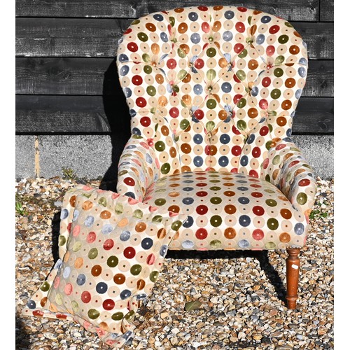 471 - A modern spoonback nursing/bedroom chair with button back multi-coloured circle patterned fabric