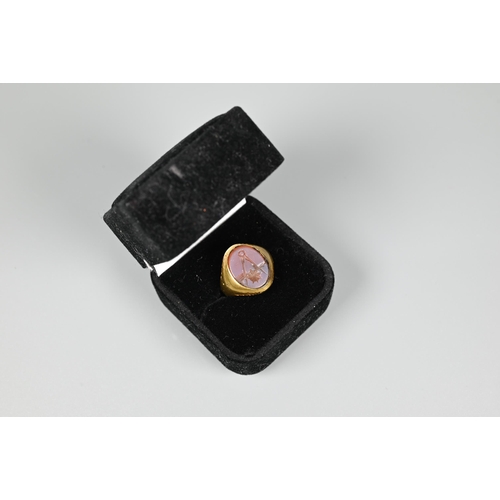 207 - A Masonic signet ring, yellow metal set with chalcedony, size N (stone cracked)