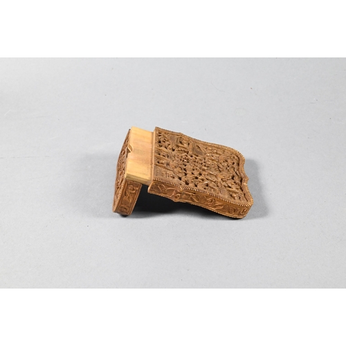 408 - A 19th century Chinese Canton sandalwood card case profusely carved with a village scene, dwellings ... 