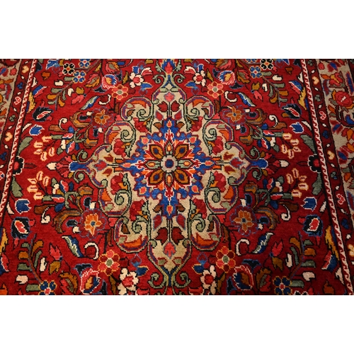 839 - A Persian Lilihen carpet, 295 cm x 159 cm