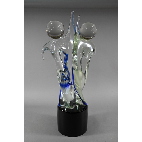 1308 - A large Stefano Toso Murano glass group, dancing couple, on cylindrical black glass plinth, 77 cm hi... 