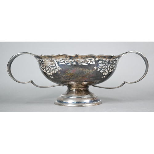 102 - Silver bowl with Art Nouveau-style piercing and twin scroll handles, on raised moulded foot, Walker ... 