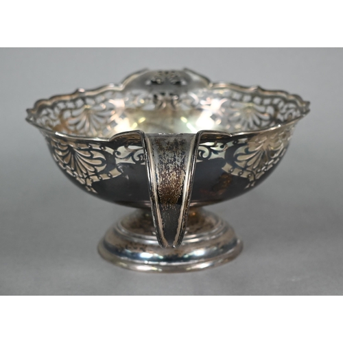 102 - Silver bowl with Art Nouveau-style piercing and twin scroll handles, on raised moulded foot, Walker ... 