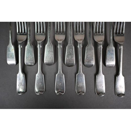 106 - Set of six each Edwardian silver fiddle pattern dessert spoons and forks, Josiah Williams & Co, ... 