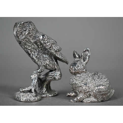 119 - Well-modelled small silver rabbit, London import 1993 ('filled'), 4.5cm high, to/w a cast metal ... 