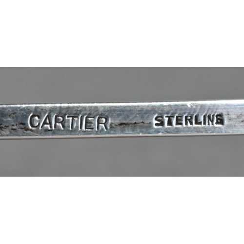 122 - Cartier Sterling snuffer with pineapple finial and twist stem, on turned wood handle, 27cm long