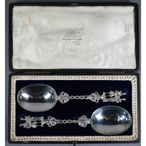 135 - Pair of good quality Victorian silver serving spoons with oval bowls and ornate stems, cast and chas... 