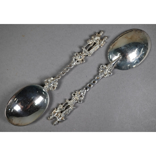 135 - Pair of good quality Victorian silver serving spoons with oval bowls and ornate stems, cast and chas... 