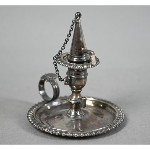 141 - George IV silver chamber taper-stick with gadrooned rims and shell-mounted ring handle, c/w original... 