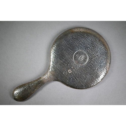 149 - Planished silver hand-mirror, brush, button-hook, shoehorn and two jar-lids, A&J Zimmerman Ltd, ... 