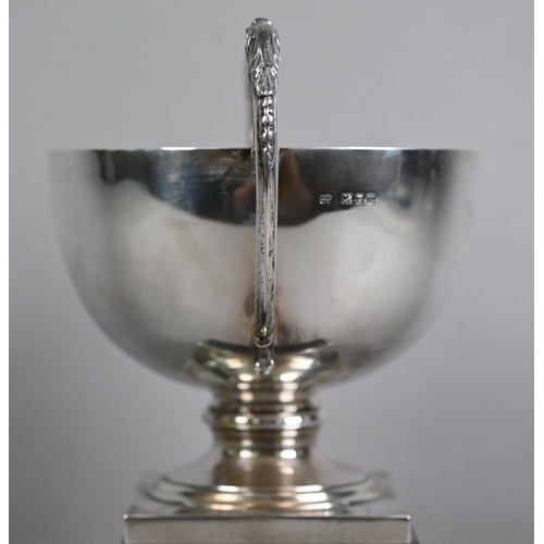 153 - Silver trophy cup with twin leopards' head scrolling handles and engraved with the City of Wincheste... 