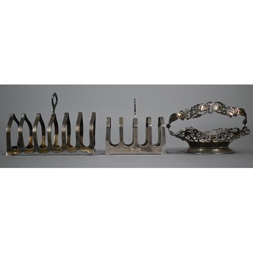 155 - Silver six-division toast-rack and a four-division example, to/w a Dutch pierced bonbon basket with ... 