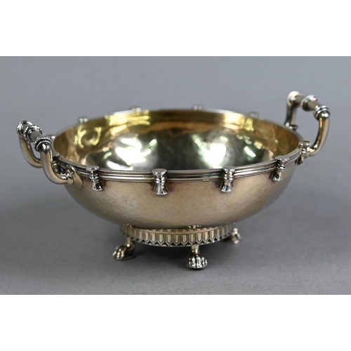 166 - Arts & Crafts planished silver gilt bowl with twin handles, on four claw feet, Wakeley & Whe... 