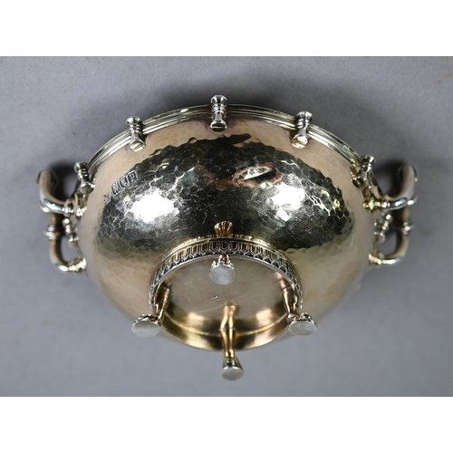 166 - Arts & Crafts planished silver gilt bowl with twin handles, on four claw feet, Wakeley & Whe... 