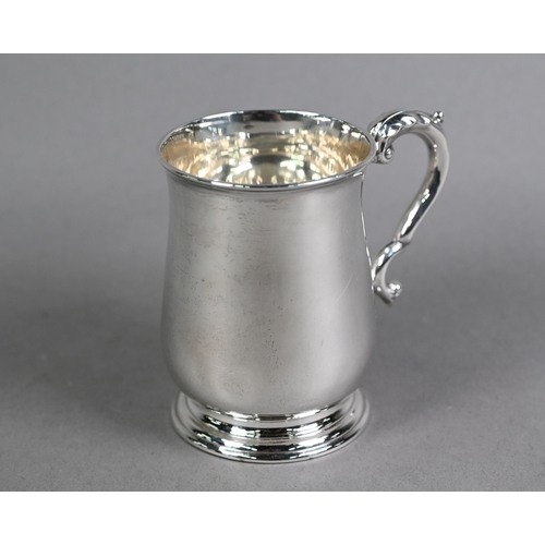 167 - Silver baluster half-pint mug in the Georgian manner, with scroll handle and moulded foot-rim, Willi... 