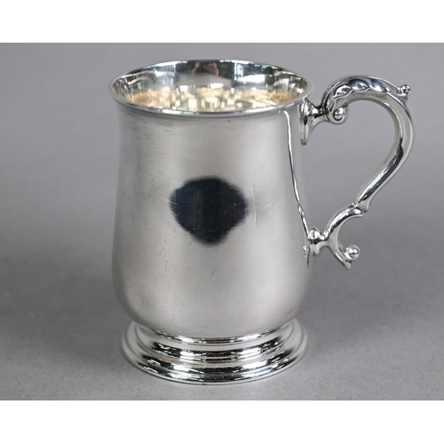 167 - Silver baluster half-pint mug in the Georgian manner, with scroll handle and moulded foot-rim, Willi... 