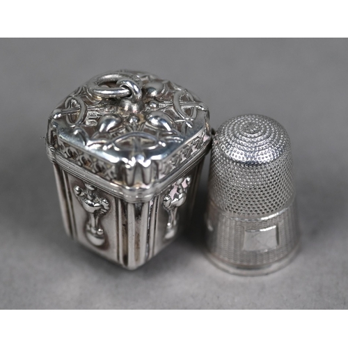 181 - A Victorian thimble-case of square tapering form with embossed decoration, hinged cover with suspens... 