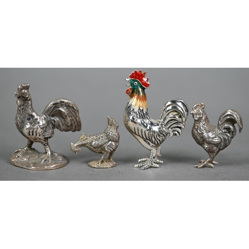 185 - Three miniature silver chickens - one with enamelled head - to/w a white metal example (mark not ide... 