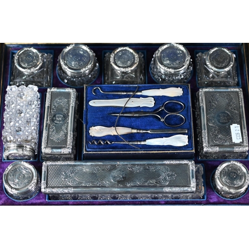 187 - Victorian brass-inlaid coromandel dressing case, the cut glass fittings with silver tops - some in s... 