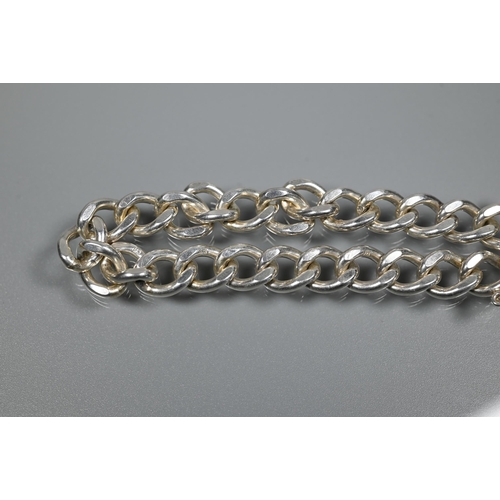 209 - Two modern silver curb bracelets, each fitted with safety chain and padlock, approx 70.3g (2)