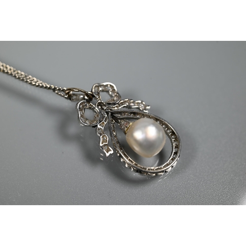 213 - A Belle Epoque diamond and pearl pendant, the old cut diamond-set bow above a tear-shaped diamond se... 