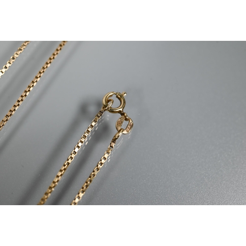 215 - Two yellow metal fine box link chains, stamped 9ct, 8.1g, 32 cm and 19 cm long each closed (2)