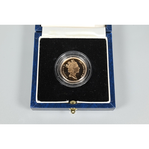 219 - A 1997 gold sovereign, cased and in box, c/w certificate of authenticity