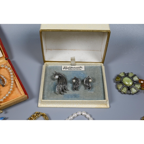 226 - A collection of vintage costume jewellery including Ciro graduated pearls in original box, marcasite... 