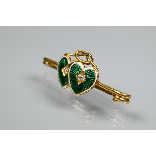 228 - An Edwardian 18ct yellow gold bar brooch featuring two conjoined green and white enamelled hearts, w... 