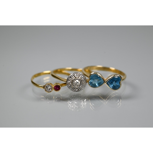 232 - Three various 18ct gold rings comprising a circular platinum set diamond cluster, size O; a pair of ... 