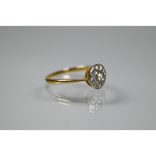 232 - Three various 18ct gold rings comprising a circular platinum set diamond cluster, size O; a pair of ... 