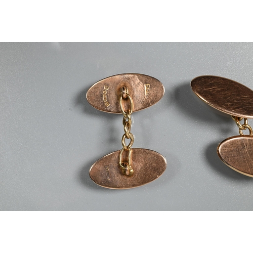 233A - Two pairs of 9ct gold oval cufflinks, both with chain links, one rose gold and of plain design, the ... 