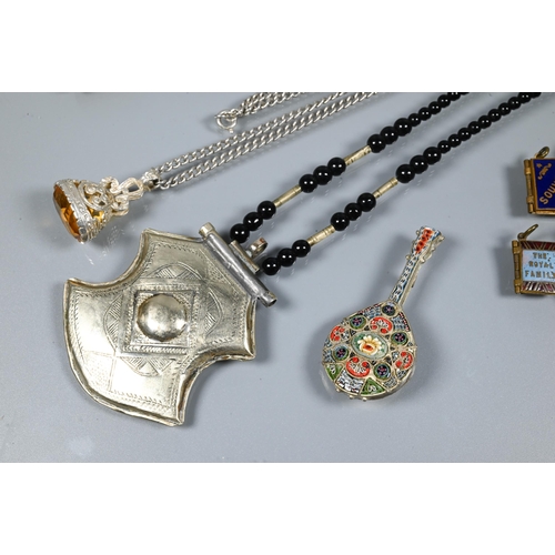 249 - A small collection of jewellery and other items including amber necklace, Middle Eastern necklace, a... 