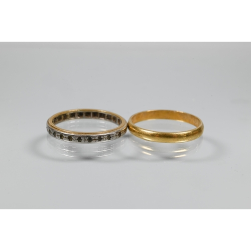 261 - An 18ct yellow gold wedding band, size N, 1.9g to/w another yellow and white metal band (2)