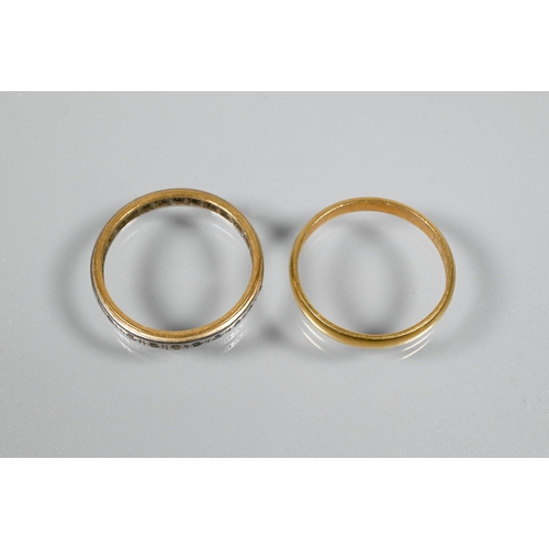 261 - An 18ct yellow gold wedding band, size N, 1.9g to/w another yellow and white metal band (2)