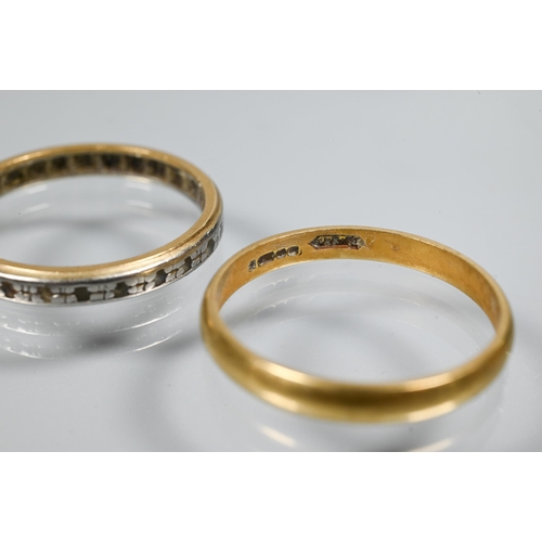 261 - An 18ct yellow gold wedding band, size N, 1.9g to/w another yellow and white metal band (2)