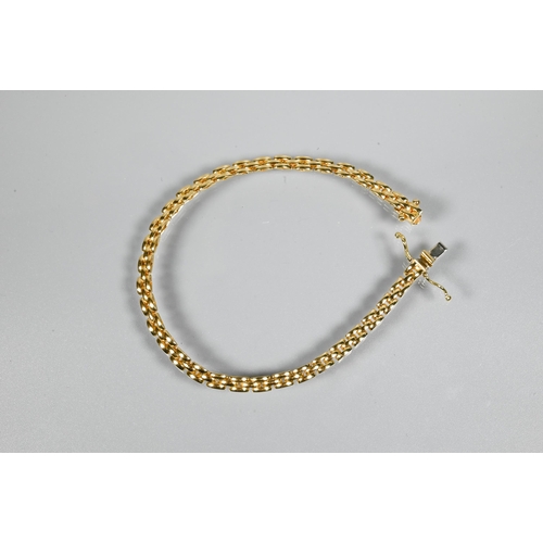 263 - A contemporary yellow metal brick link bracelet, with concealed clasp, stamped 750, approx 8.4g to/w... 