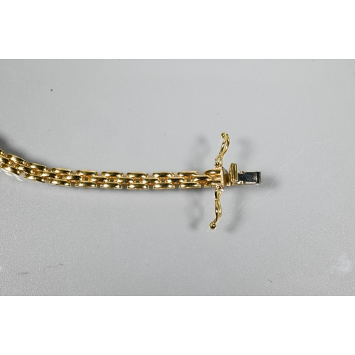 263 - A contemporary yellow metal brick link bracelet, with concealed clasp, stamped 750, approx 8.4g to/w... 